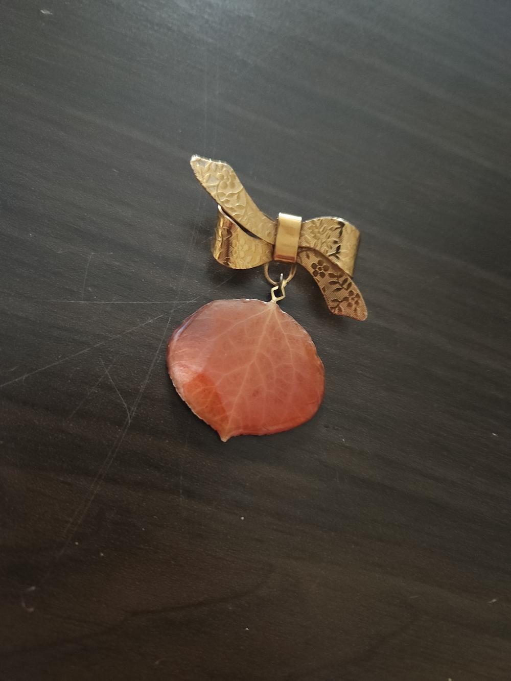 Gold Bow Brooch with Coral Leaf Pendant